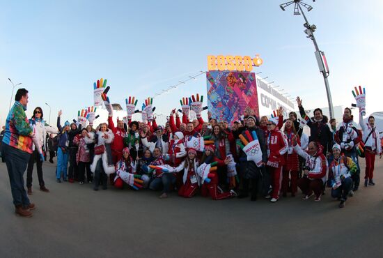 Spectators arrive at the opening ceremony of the 2014 Winter Olympics