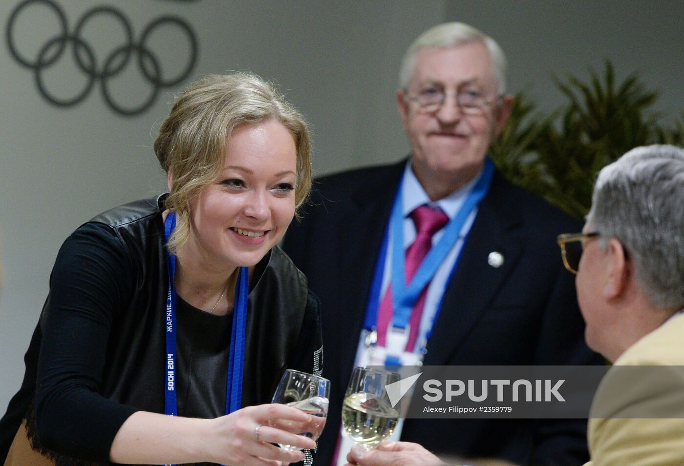Spectators arrive at the opening ceremony of the 2014 Winter Olympics