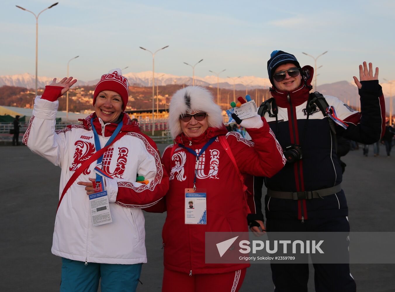 Spectators arrive at the opening ceremony of the 2014 Winter Olympics