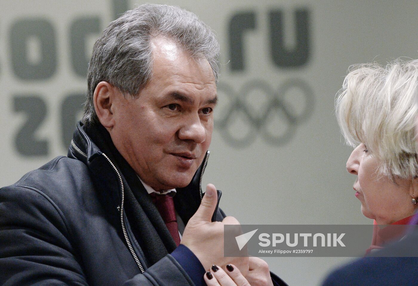 Spectators arrive at the opening ceremony of the 2014 Winter Olympics