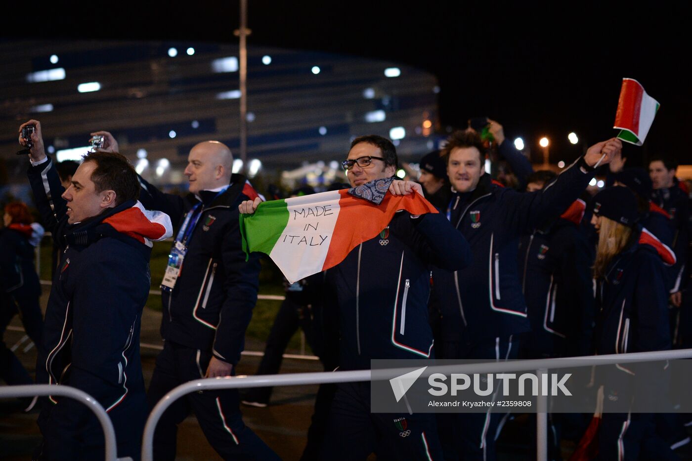 Spectators arrive at the opening ceremony of the XXI Olympic Winter Games