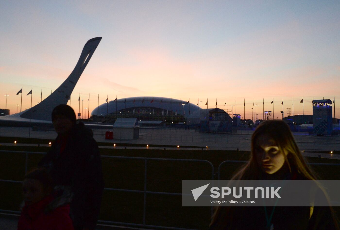Spectators arrive for the XXII Olympic Winter Games opening
