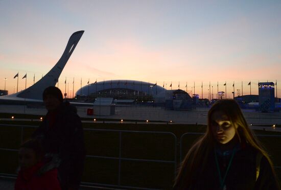 Spectators arrive for the XXII Olympic Winter Games opening