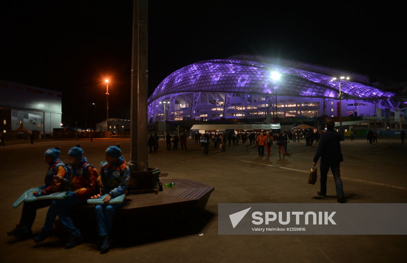 Spectators arrive for the XXII Olympic Winter Games opening