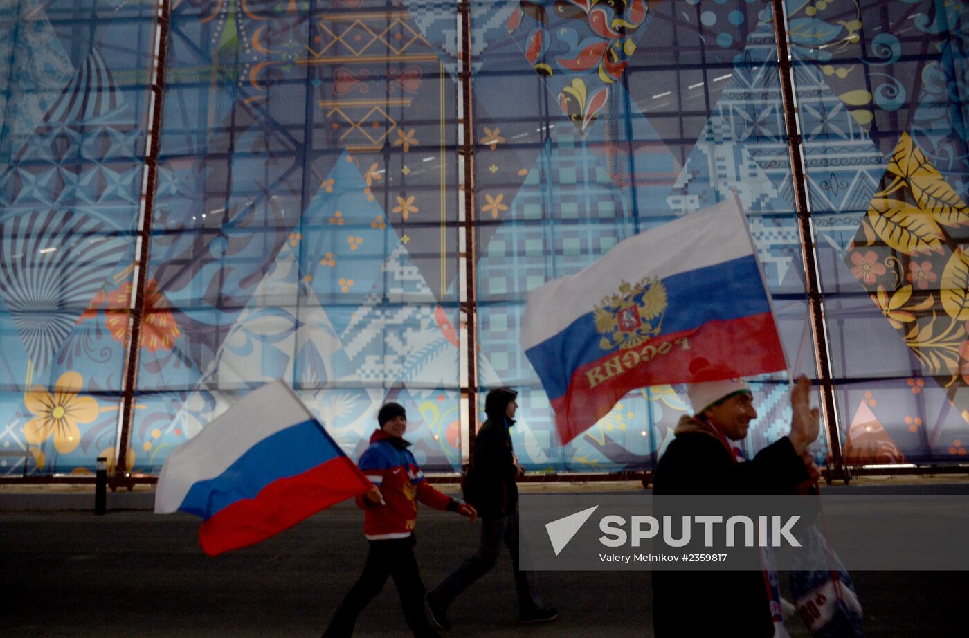 Spectators arrive for the XXII Olympic Winter Games opening