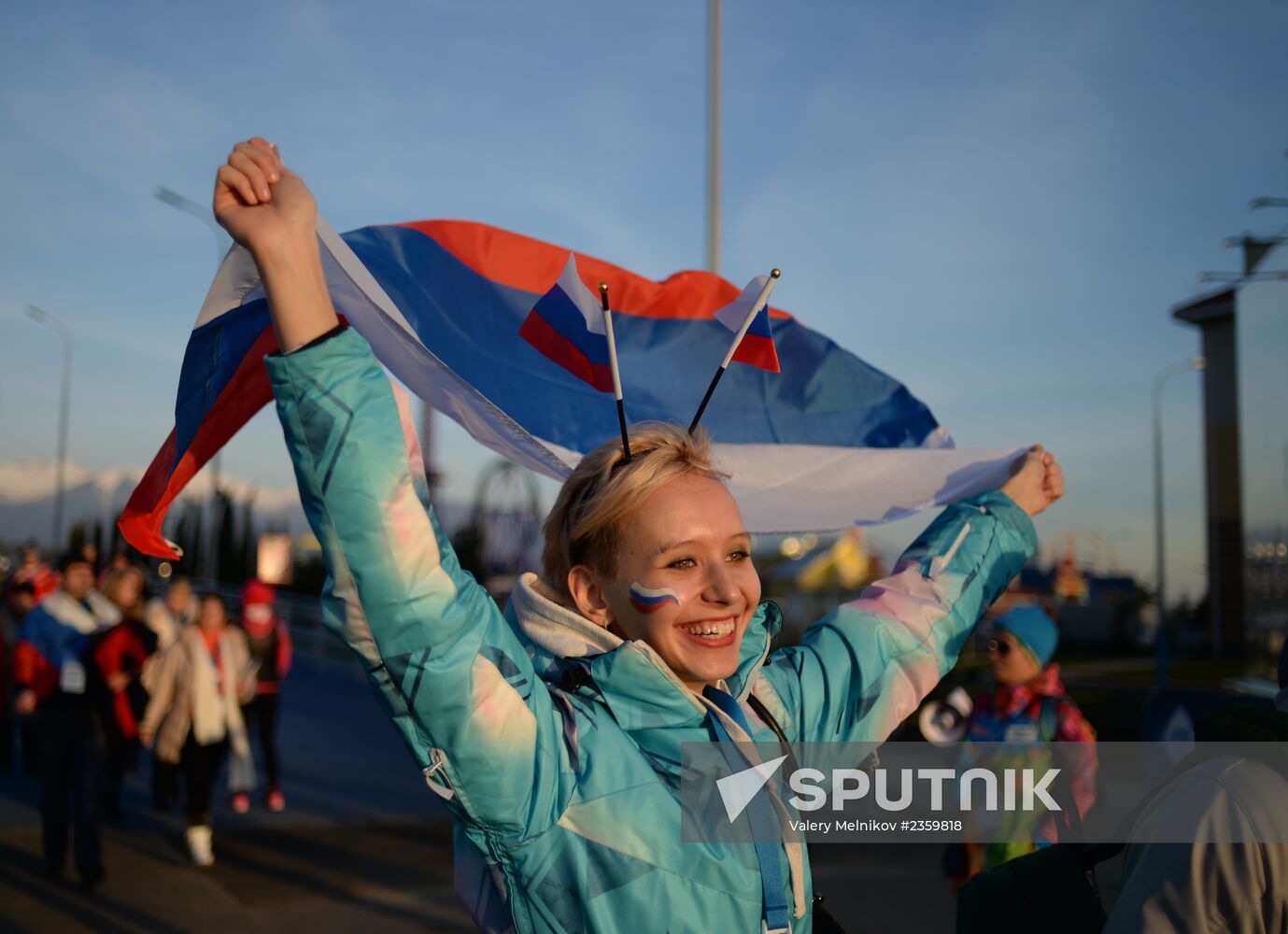 Spectators arrive for the XXII Olympic Winter Games opening