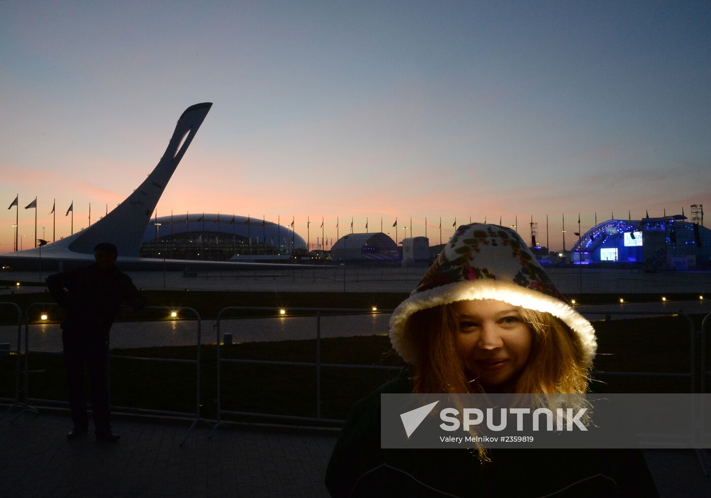 Spectators arrive for the XXII Olympic Winter Games opening