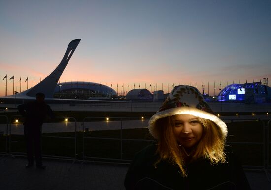 Spectators arrive for the XXII Olympic Winter Games opening