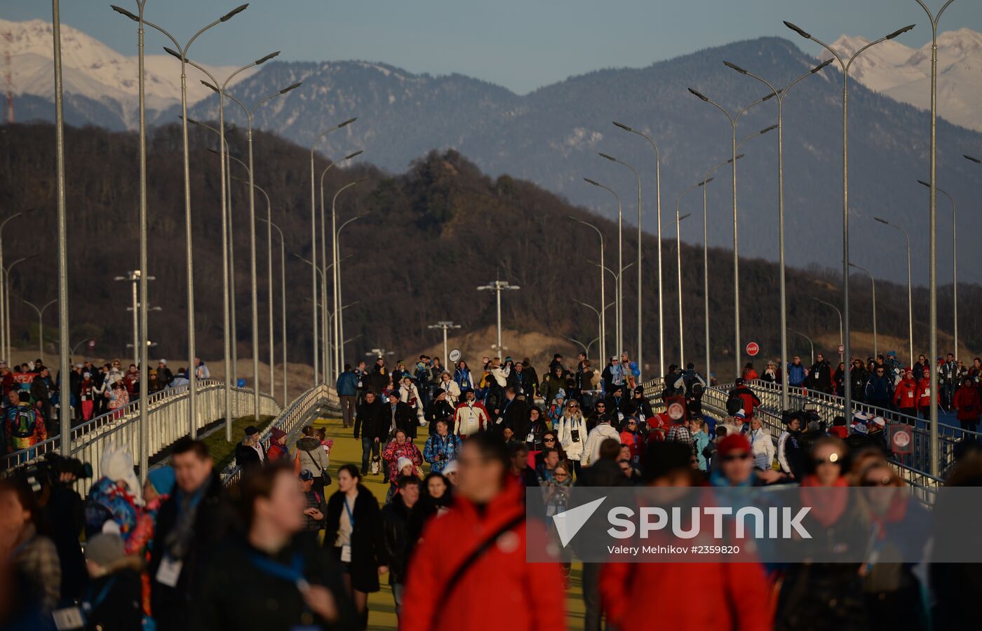 Spectators arrive for the XXII Olympic Winter Games opening