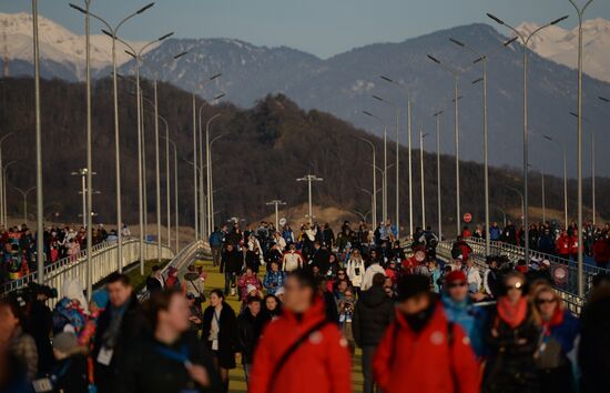 Spectators arrive for the XXII Olympic Winter Games opening