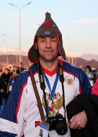 Spectators arrive for the XXII Olympic Winter Games opening