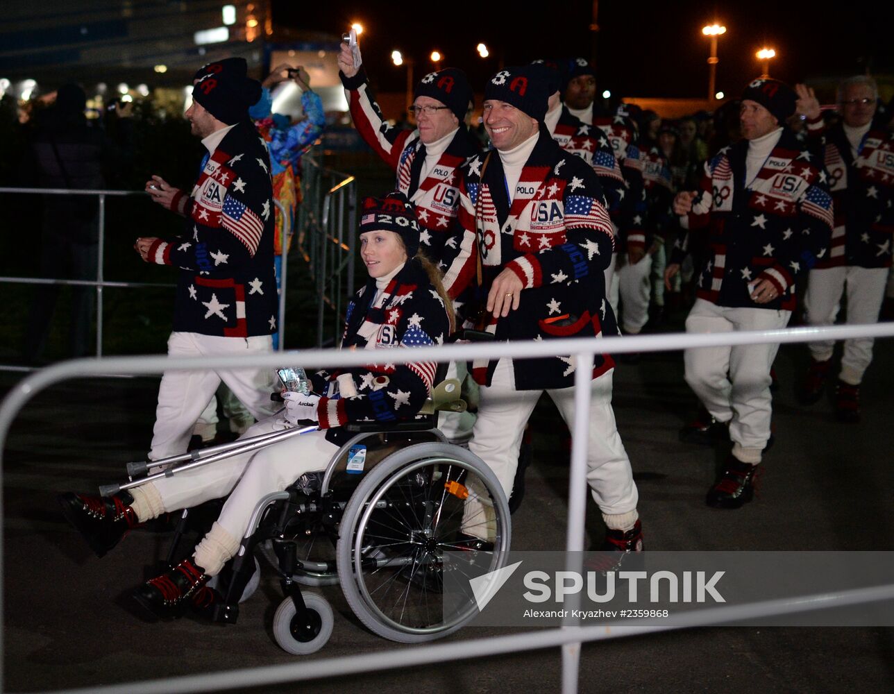 Spectators arrive at the opening ceremony of the XXI Olympic Winter Games