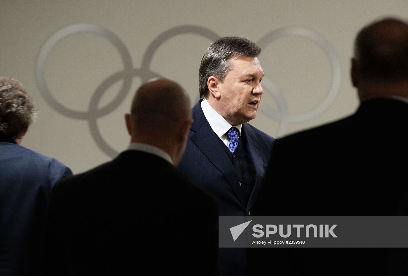 Spectators arrive for the XXII Olympic Winter Games opening