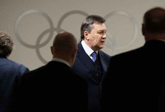 Spectators arrive for the XXII Olympic Winter Games opening