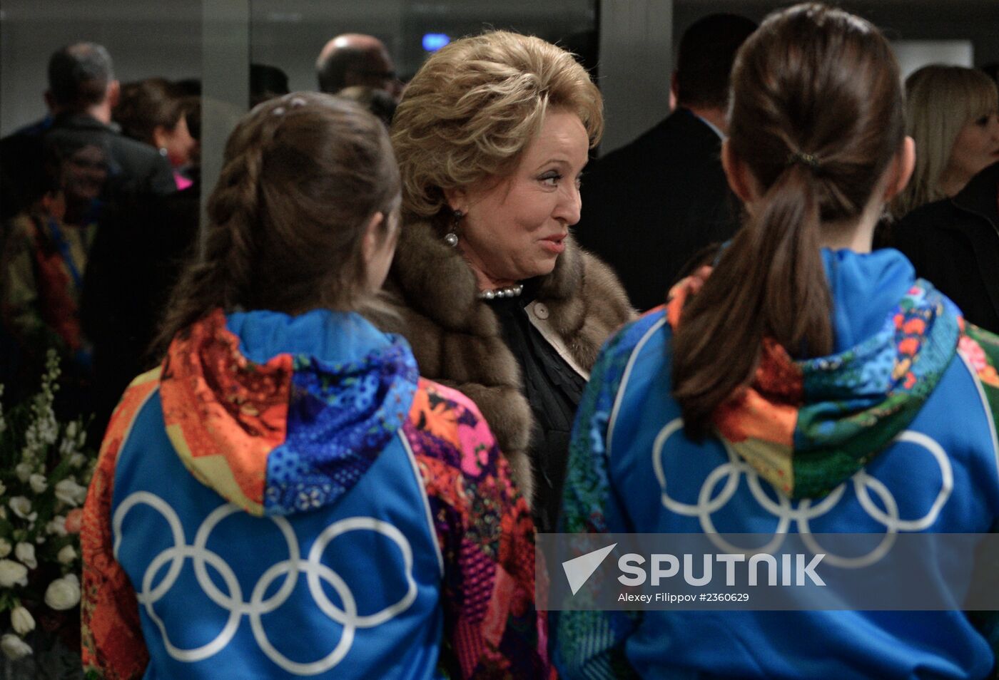 Spectators arrive for the XXII Olympic Winter Games opening