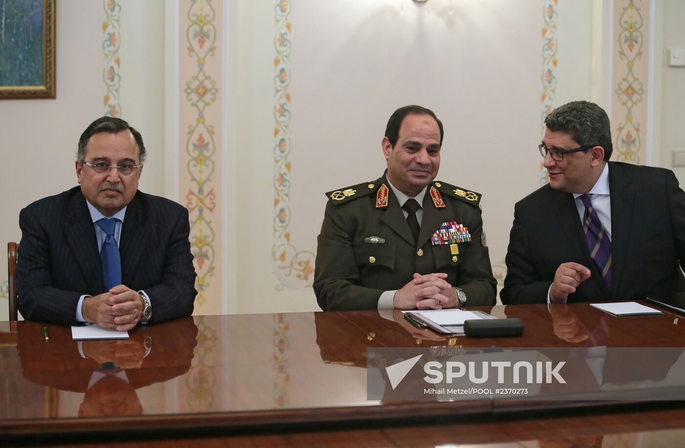 Vladimir Putin meets with Nabil Fahmi and Abdel Fattah el-Sisi