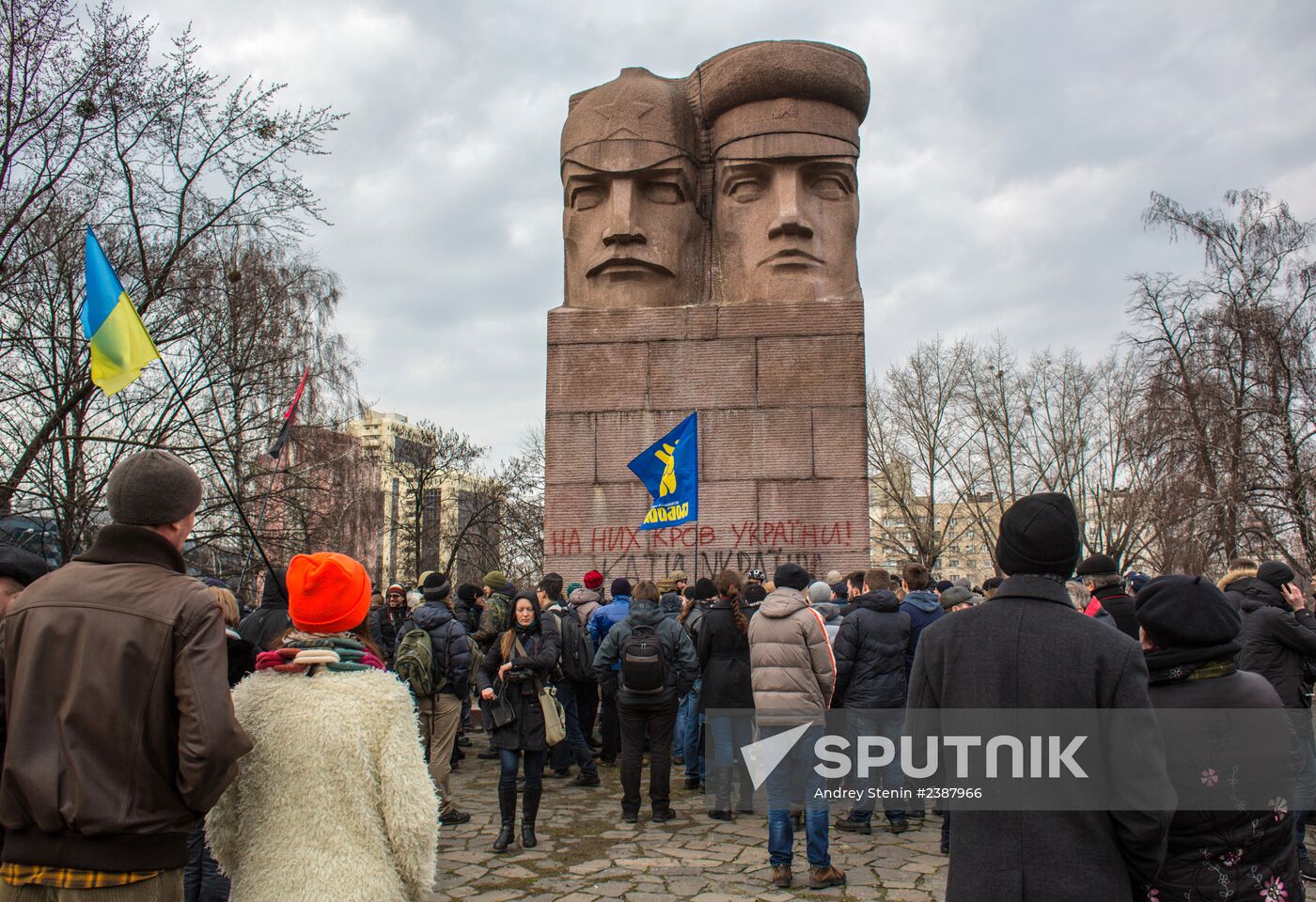 Opposition supporters destroy monument to KGB servicemen in Kiev
