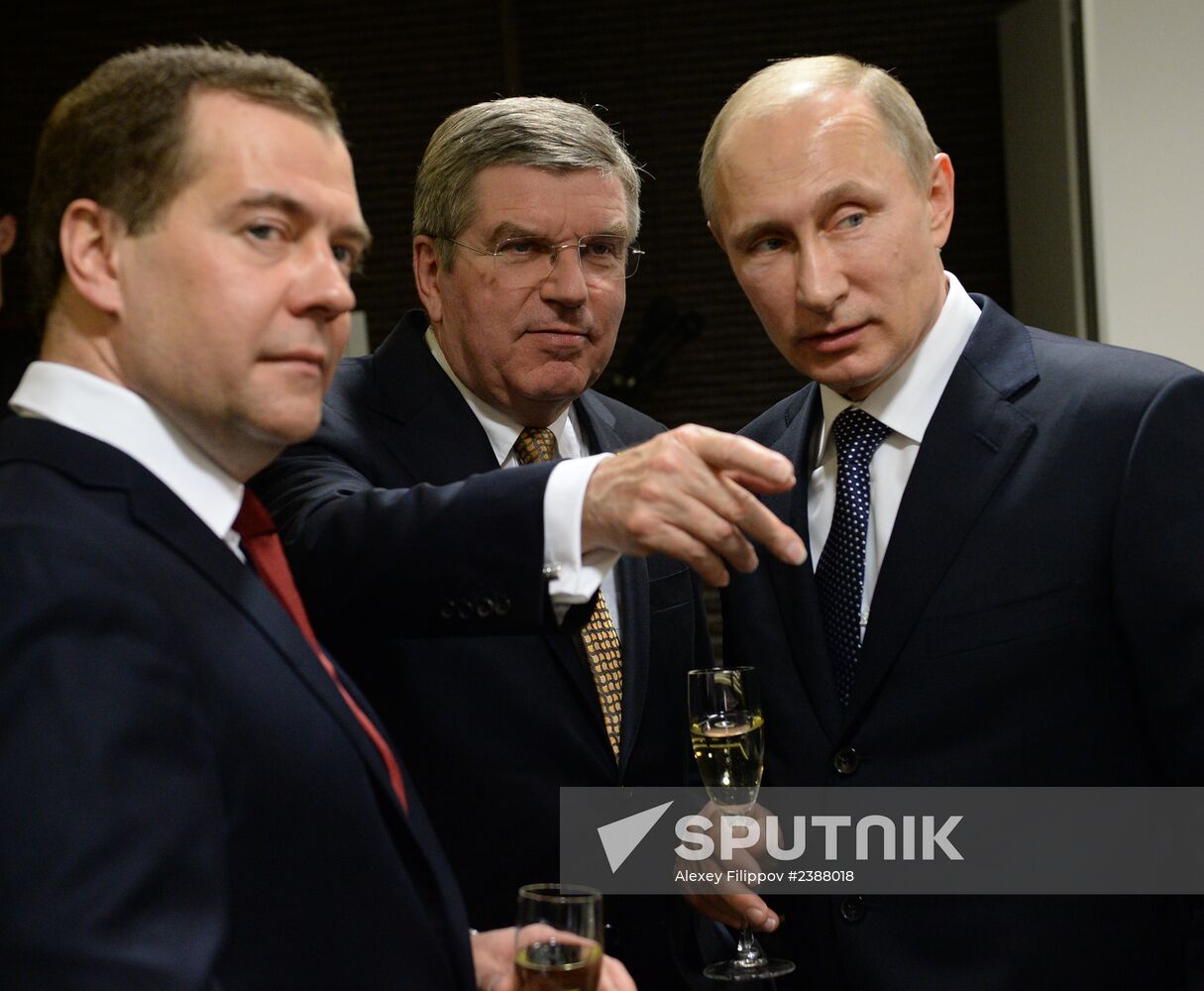 Vladimir Putin and Dmitry Medvedev at closing ceremony of XXII Olympic Winter Games in Sochi