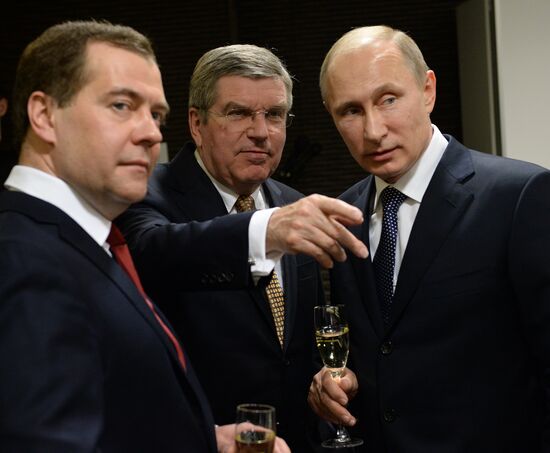 Vladimir Putin and Dmitry Medvedev at closing ceremony of XXII Olympic Winter Games in Sochi