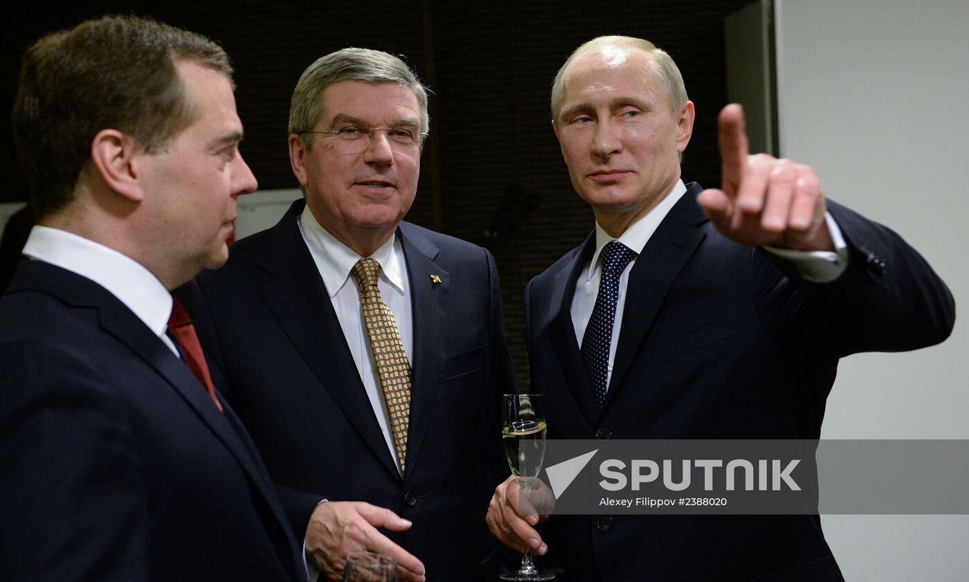 Vladimir Putin and Dmitry Medvedev at closing ceremony of XXII Olympic Winter Games in Sochi