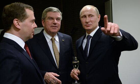 Vladimir Putin and Dmitry Medvedev at closing ceremony of XXII Olympic Winter Games in Sochi