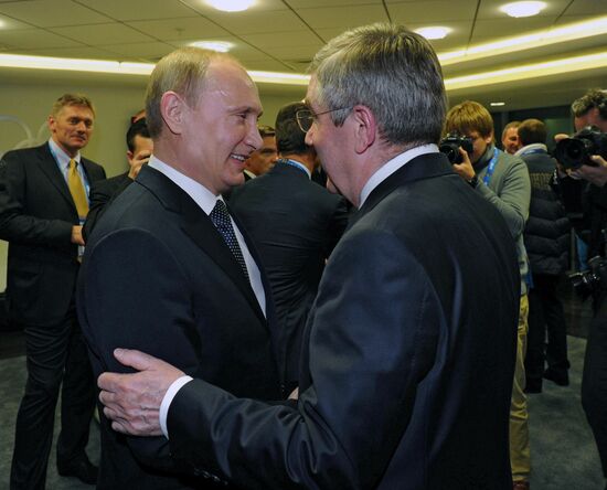 Vladimir Putin and Dmitry Medvedev at closing ceremony of XXII Olympic Winter Games in Sochi