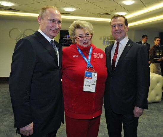 Vladimir Putin and Dmitry Medvedev at closing ceremony of XXII Olympic Winter Games in Sochi