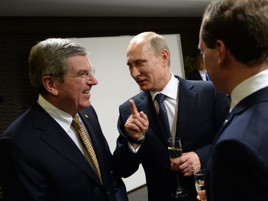 Vladimir Putin and Dmitry Medvedev at closing ceremony of XXII Olympic Winter Games in Sochi