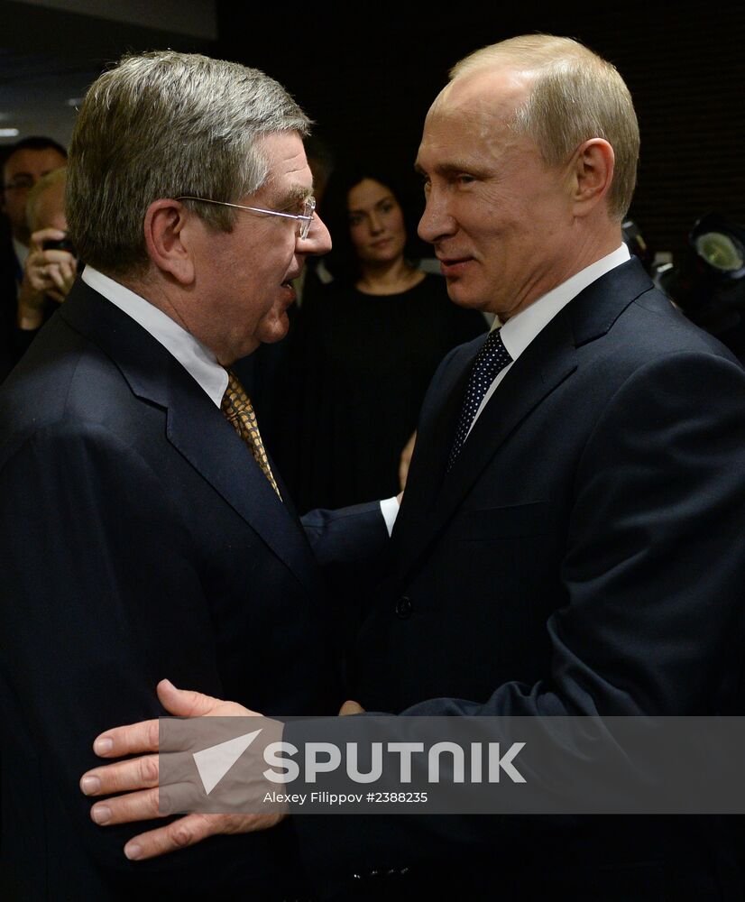 Vladimir Putin and Dmitry Medvedev at closing ceremony of XXII Olympic Winter Games in Sochi