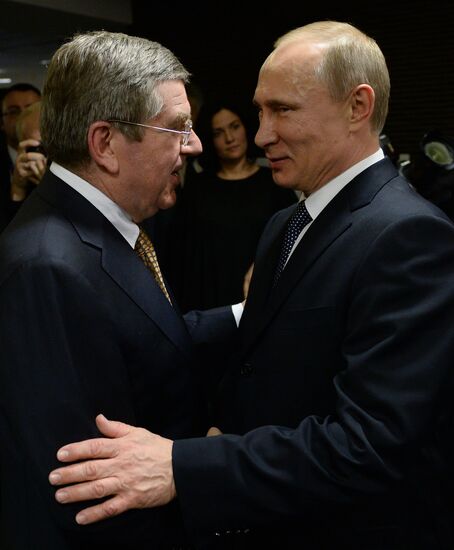 Vladimir Putin and Dmitry Medvedev at closing ceremony of XXII Olympic Winter Games in Sochi