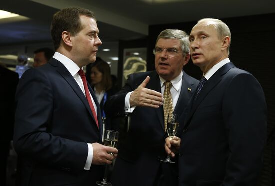 Vladimir Putin and Dmitry Medvedev at closing ceremony of XXII Olympic Winter Games in Sochi