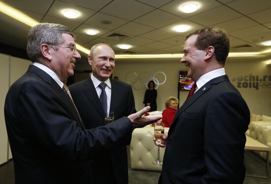 V.Putin and D.Medvedev at closing ceremony of XXII Olympic Winter Games in Sochi