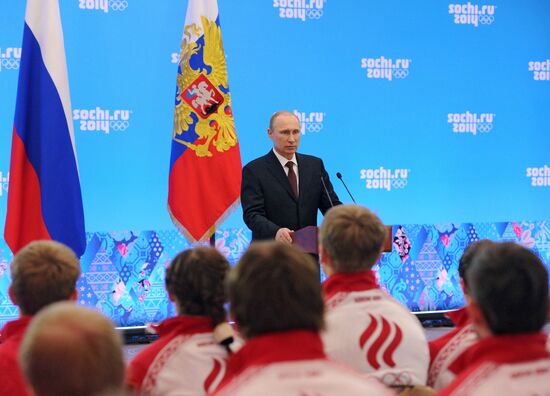 Vladimir Putin during award ceremony for Russian Olympic medalists in Sochi
