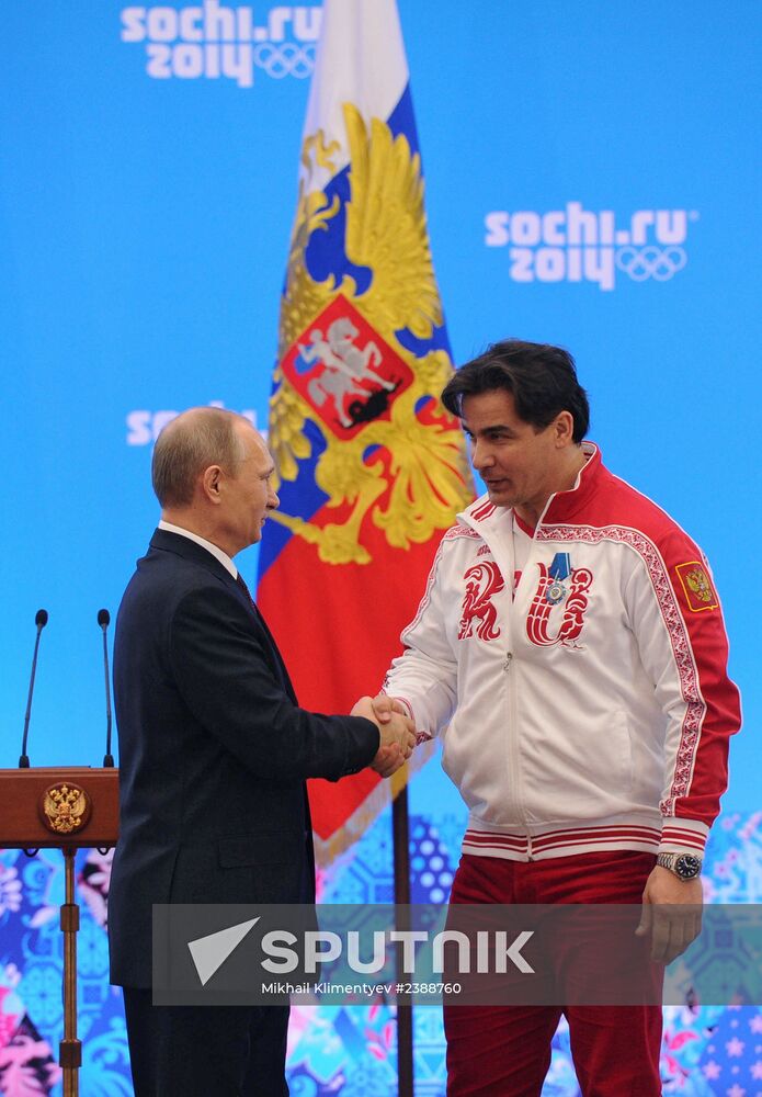 Vladimir Putin during award ceremony for Russian Olympic medalists in Sochi