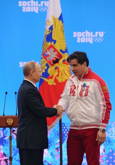 Vladimir Putin during award ceremony for Russian Olympic medalists in Sochi