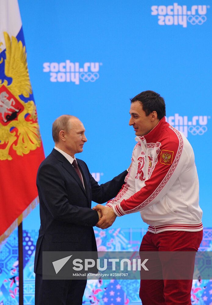 Vladimir Putin during award ceremony for Russian Olympic medalists in Sochi