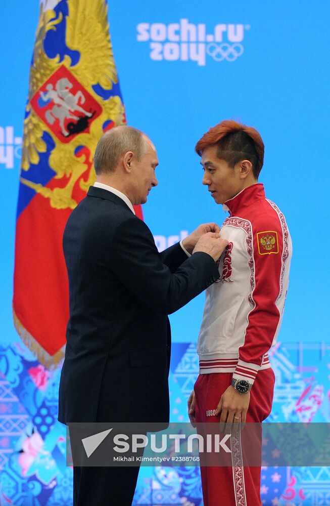 Vladimir Putin during award ceremony for Russian Olympic medalists in Sochi