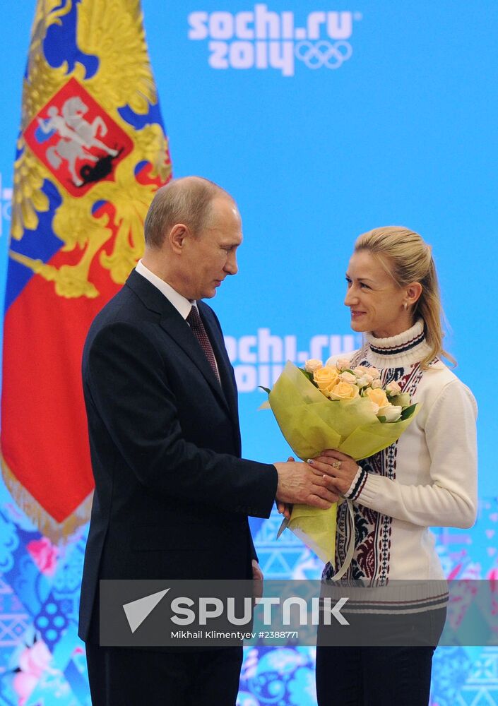 Vladimir Putin during award ceremony for Russian Olympic medalists in Sochi