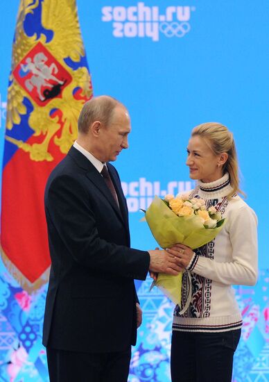 Vladimir Putin during award ceremony for Russian Olympic medalists in Sochi
