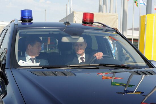 Vladimir Putin takes part in foundation of Alley of Winners at Sochi Olympic Park