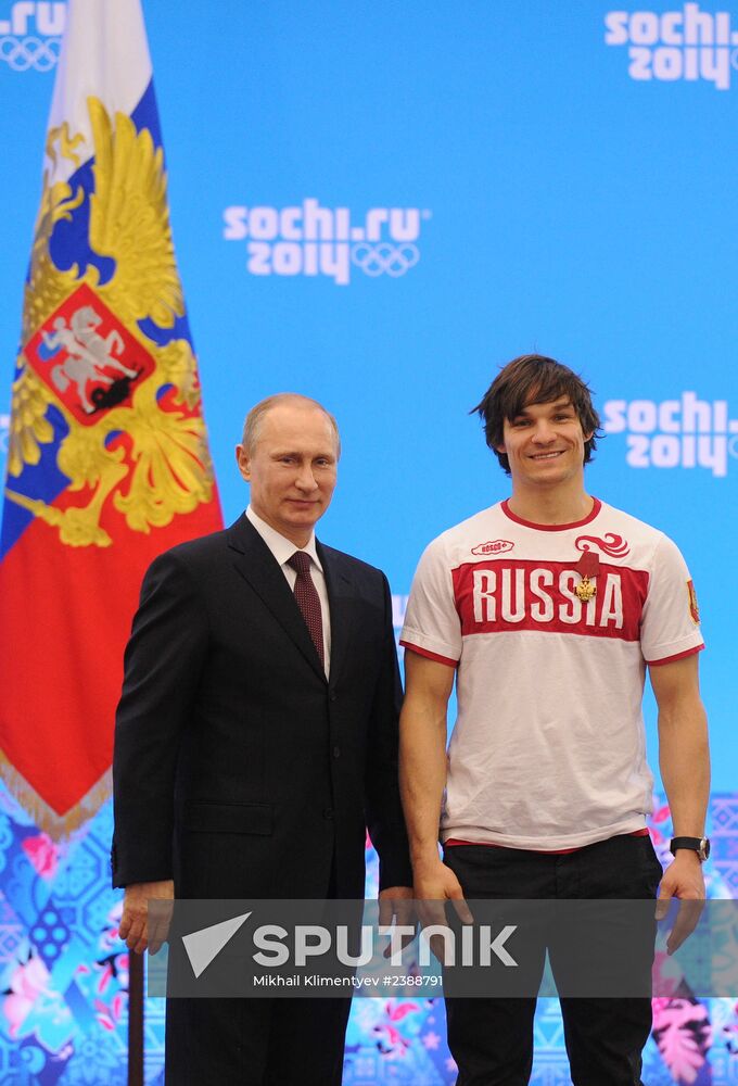 Vladimir Putin during award ceremony for Russian Olympic medalists in Sochi