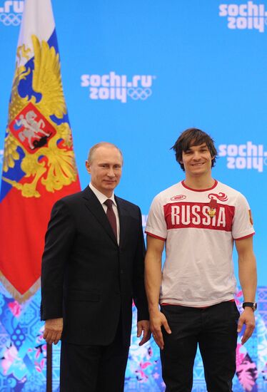Vladimir Putin during award ceremony for Russian Olympic medalists in Sochi