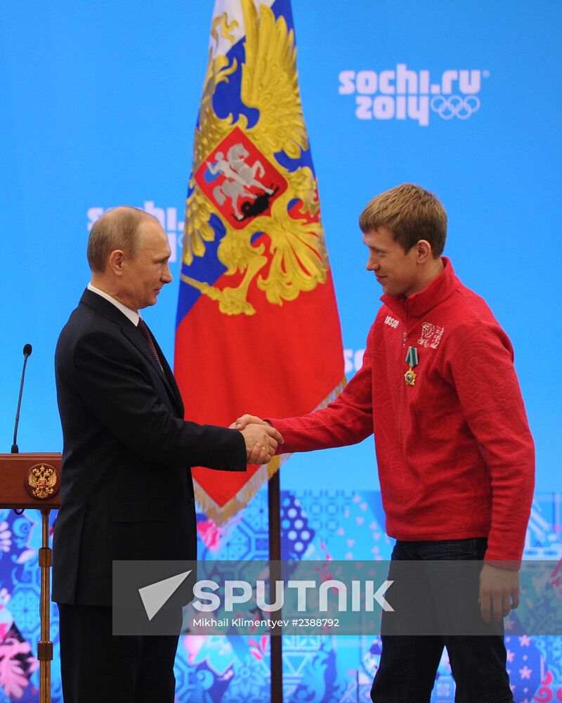 Vladimir Putin during award ceremony for Russian Olympic medalists in Sochi