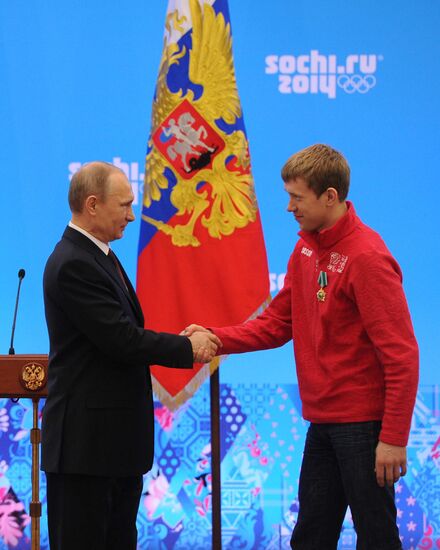 Vladimir Putin during award ceremony for Russian Olympic medalists in Sochi