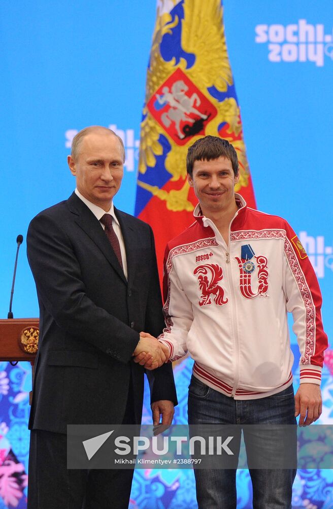 Vladimir Putin during award ceremony for Russian Olympic medalists in Sochi