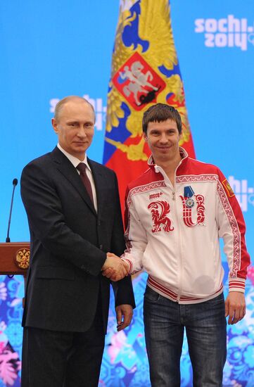 Vladimir Putin during award ceremony for Russian Olympic medalists in Sochi