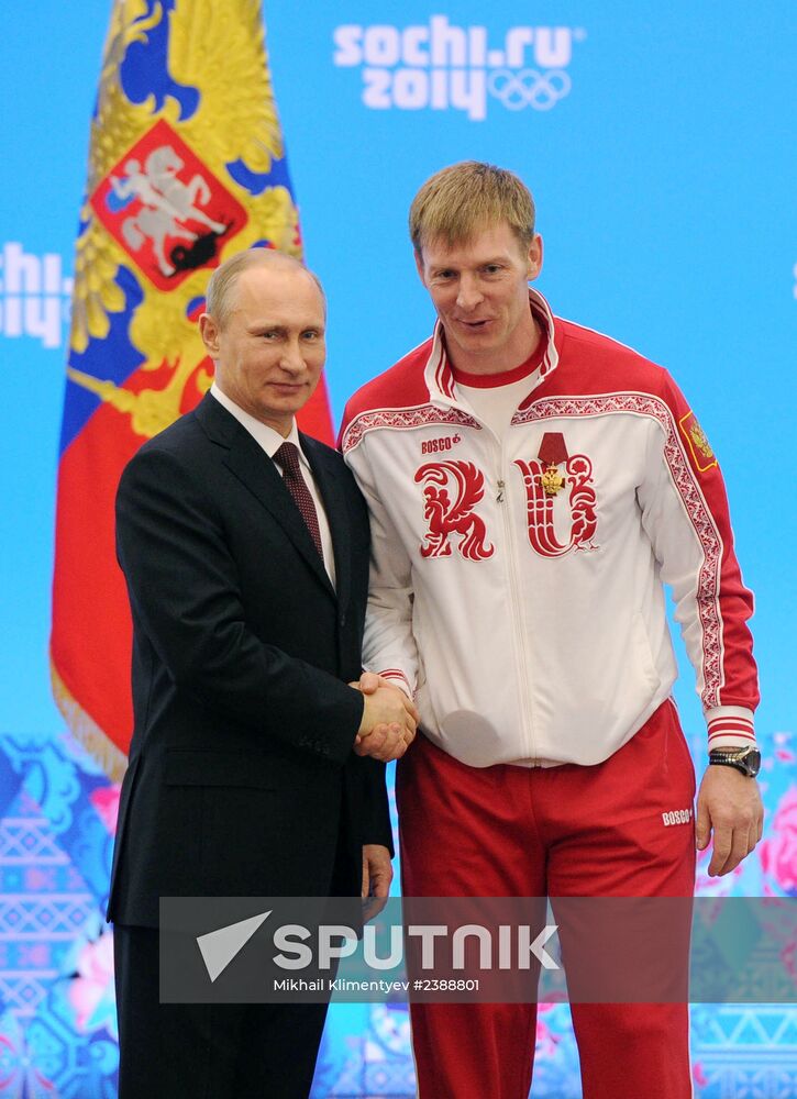 Vladimir Putin during award ceremony for Russian Olympic medalists in Sochi