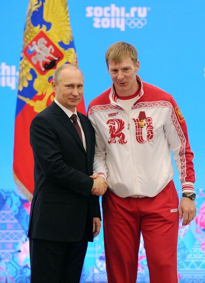 Vladimir Putin during award ceremony for Russian Olympic medalists in Sochi