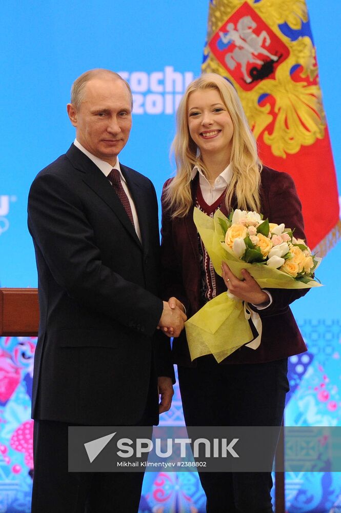 Vladimir Putin during award ceremony for Russian Olympic medalists in Sochi