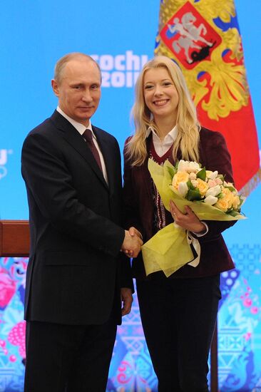 Vladimir Putin during award ceremony for Russian Olympic medalists in Sochi